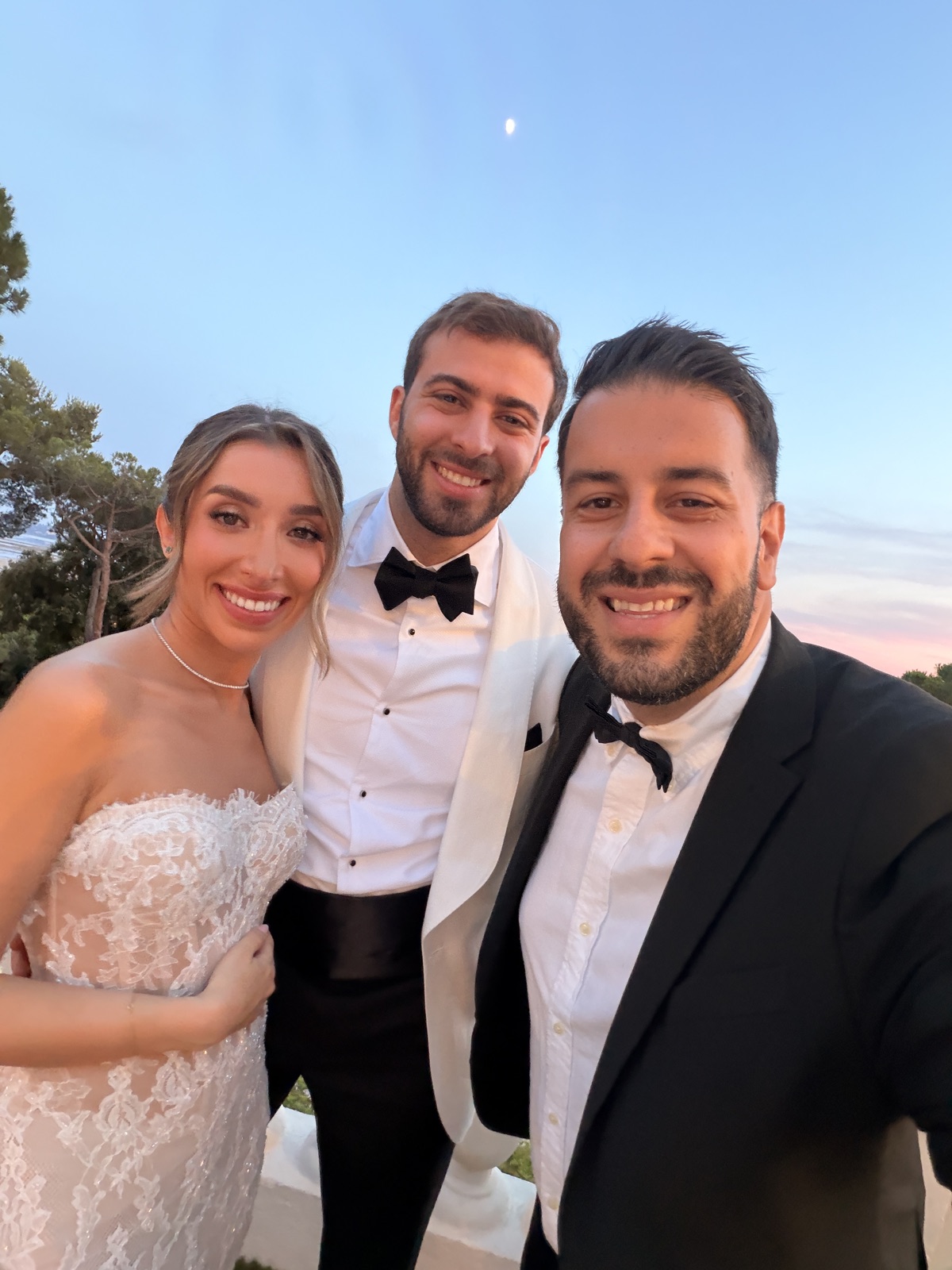 DJ Darman with a happy couple at their wedding